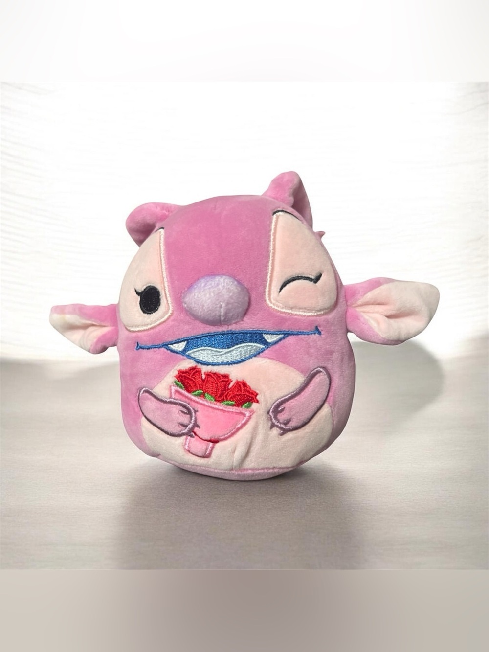 Squishmallows 5” Disney Lilo & Stitch Angel Winking Holding Flowers Pink